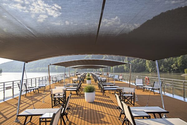 Shade canopies on sun deck of river cruise ship Excellence Empress (Reisebüro Mittelthurgau) on the Danube river, near Dürnstein, Wachau, Lower Austria, Austria